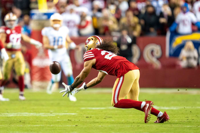 November 13, 2022; Santa Clara, California, USA; San Francisco 49ers safety Talanoa Hufanga (29) intercepts the football against Los Angeles Chargers quarterback Justin Herbert (10) during the fourth quarter at Levi's Stadium. Mandatory Credit: Kyle Terada-USA TODAY Sports